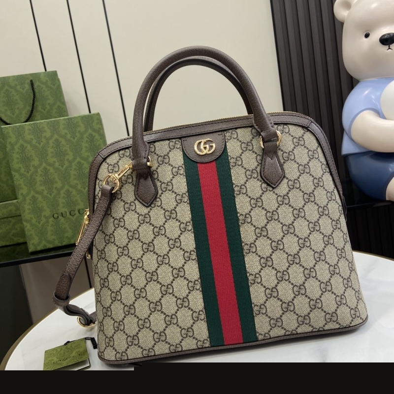 G*u*i top handle bags